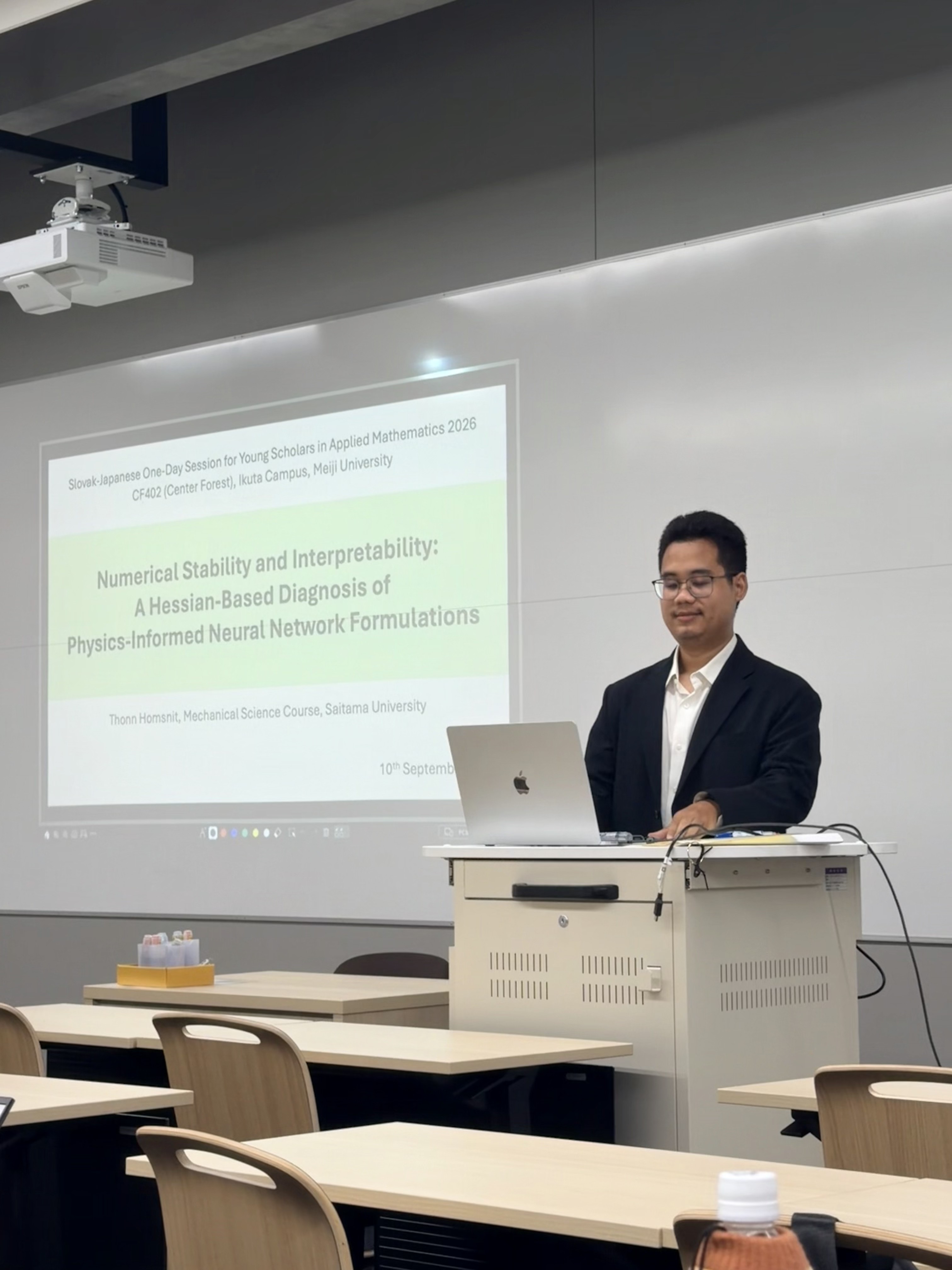 Presenting research at the Slovak–Japanese One-Day Session for Young Scholars in Applied Mathematics 2026